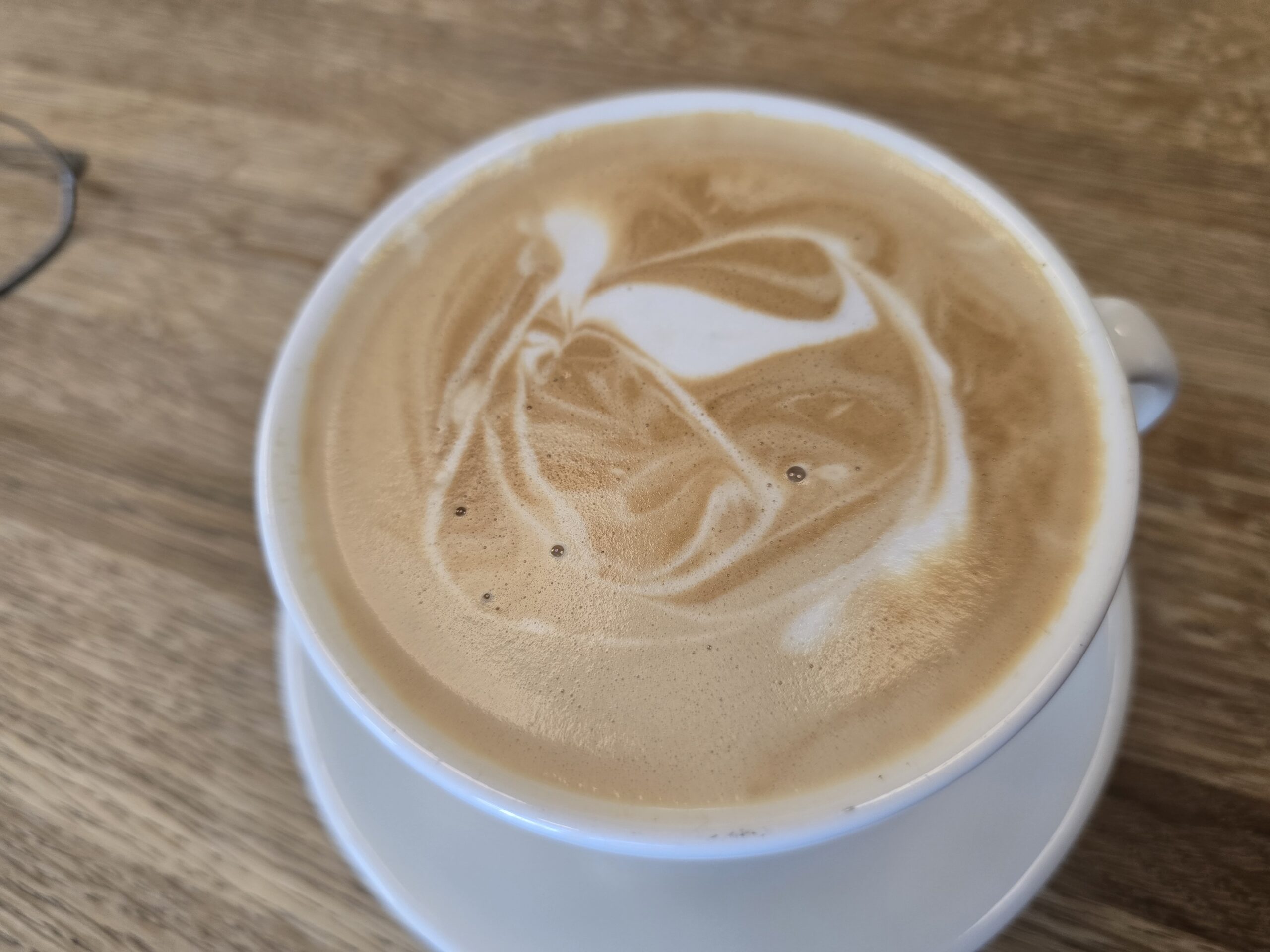 Latte Art in a White Cup