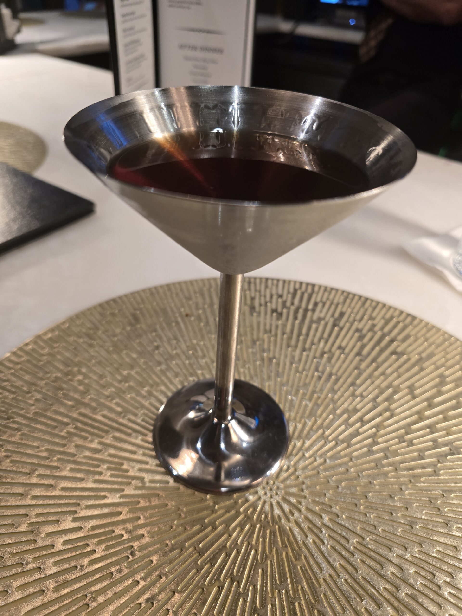 Dark Cocktail in Martini Glass at Devitos