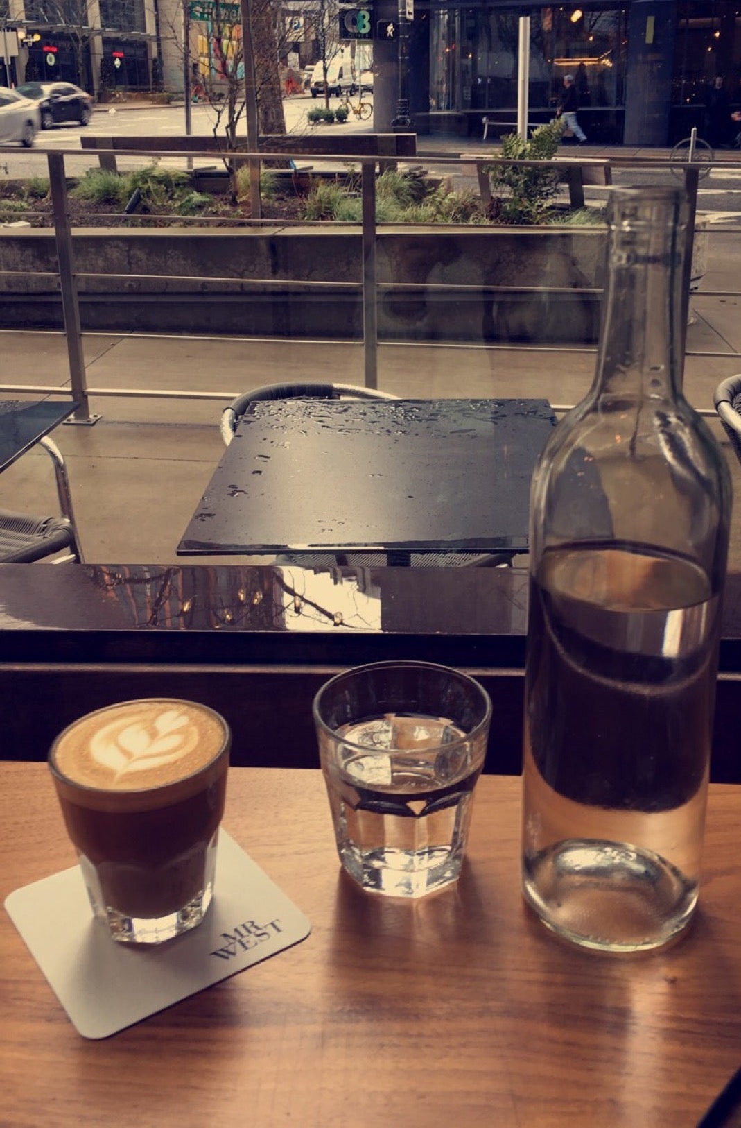 Chai Latte and Water at Mr. West Cafe Bar, Seattle WA